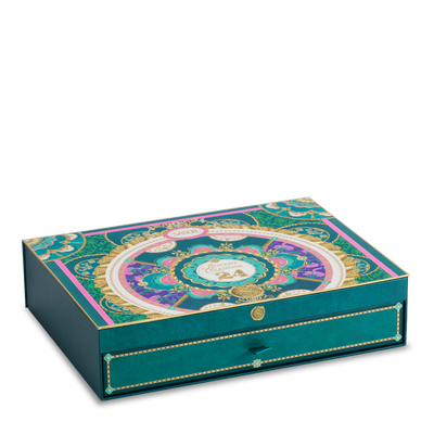 Decorative teal box with intricate patterns on a white background