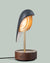 Daqi Alarm clock black porcelain bird with walnut wood base wakes up with bird sound works with an app