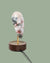 Daqi Alarm clock pale pink porcelain bird with gold accents and walnut base wakes up with bird sound works with an app