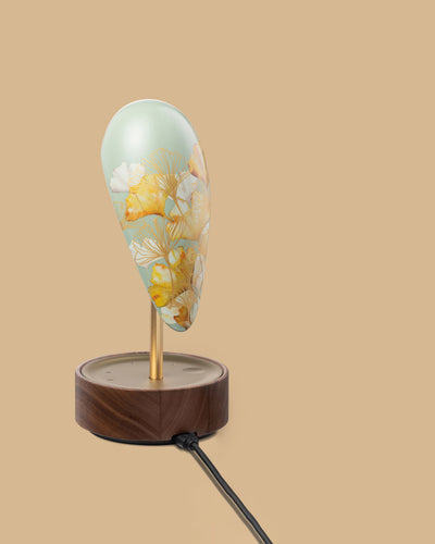 Daqi Alarm clock pale green porcelain bird with gold accents and walnut base wakes up with bird sound works with an app