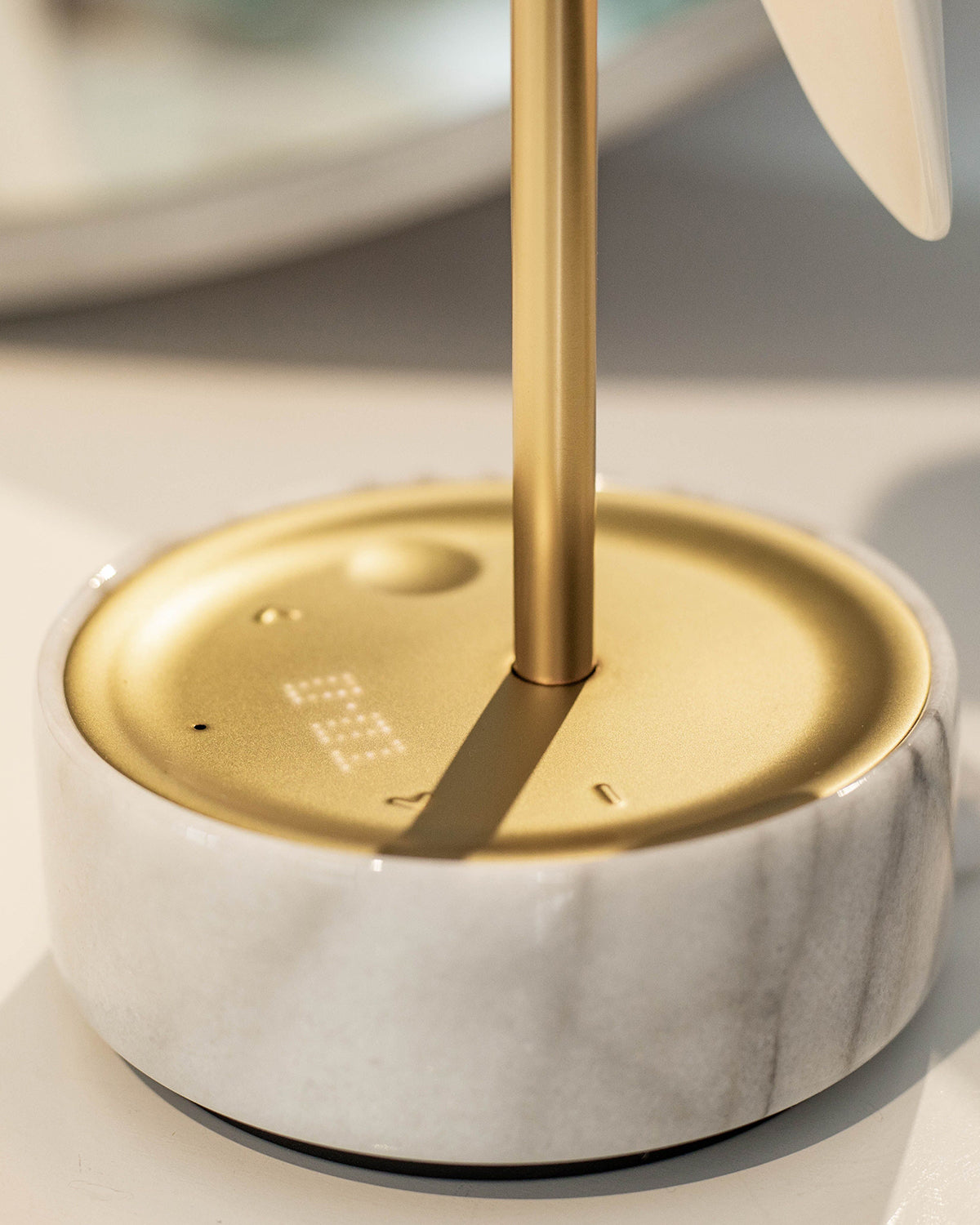 Daqi Alarm clock white porcelain bird with gold accents and white marble base wakes up with bird sound works with an app